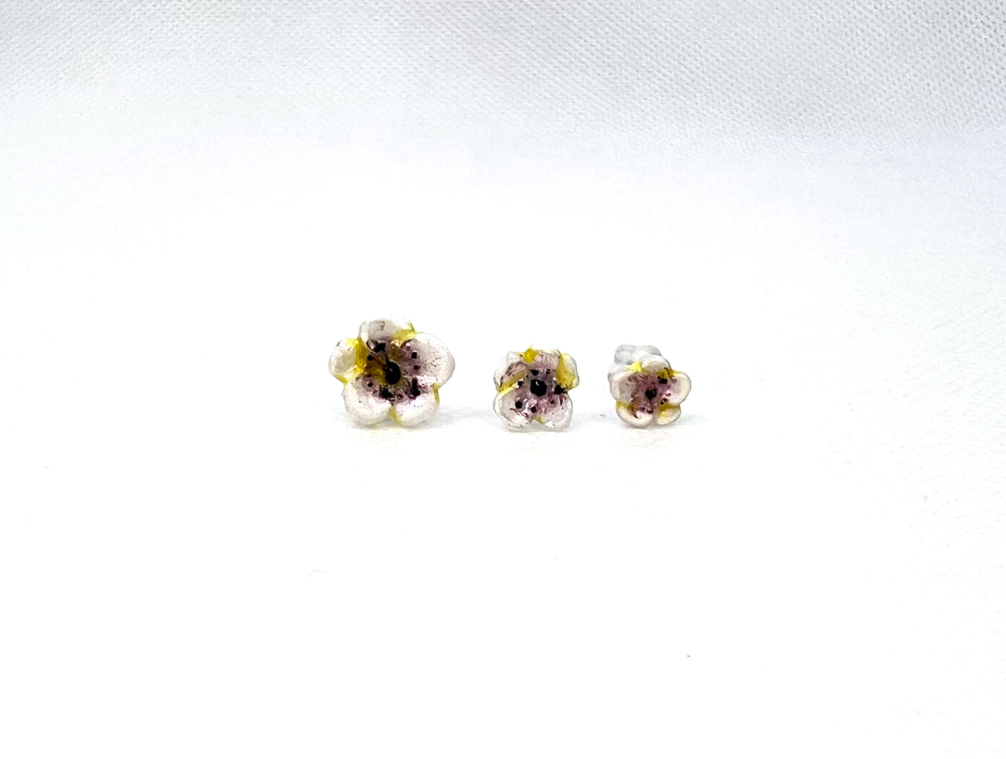 Abstract white flowers with pink shimmer earrings